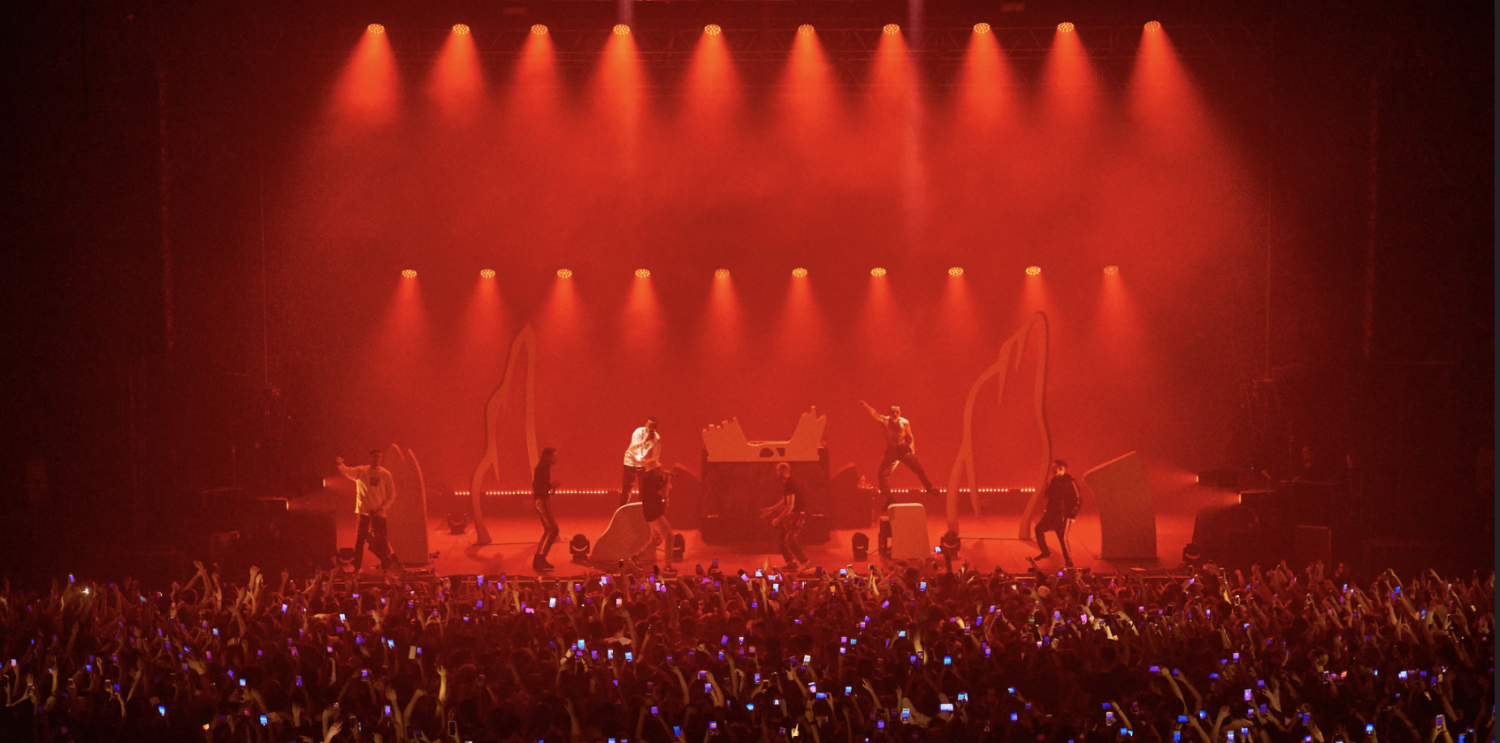 picture of concert with red lighting